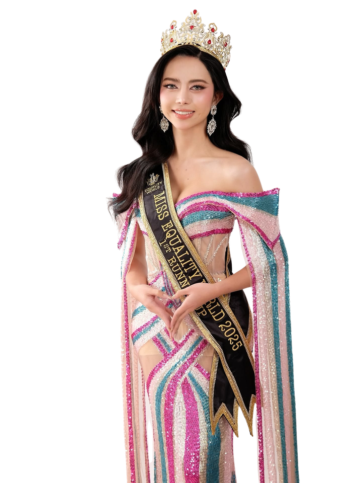 Crowned Miss Equality World 2025 runner-up in a striped gown