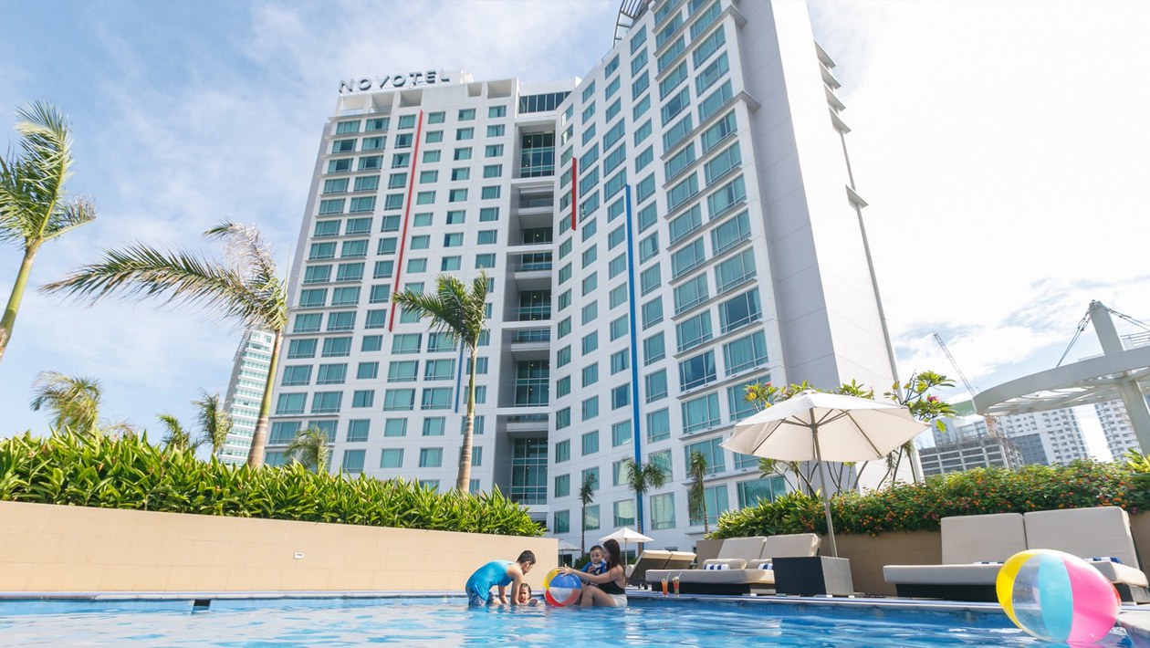 Novotel Manila Araneta City hotel tower and pool